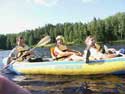 14. Rafting down Karelian rivers (V. Fomins wife - in the centre, the artist familys friend, A.Boguslawski, professor from the USA - to the right). 2004. 